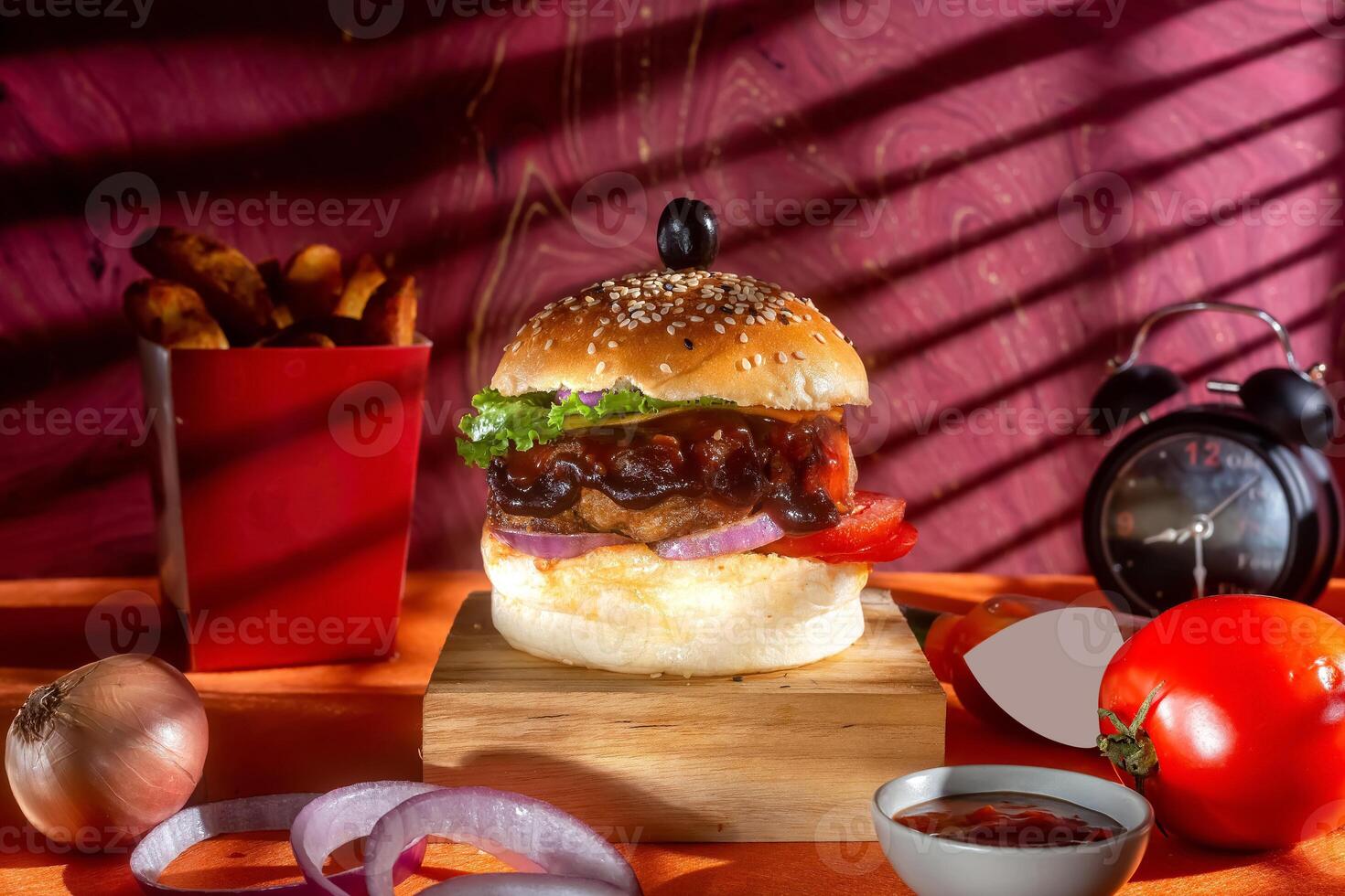 BBQ chicken cheese burger with french fries, potato and tomato slice isolated on wooden board side view on table fast food photo