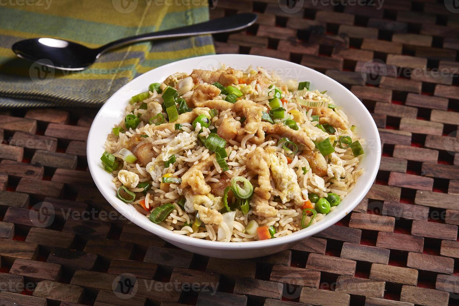 Vegetable Chicken or Mixed Fried Rice served in dish isolated on table side view of middle east food photo