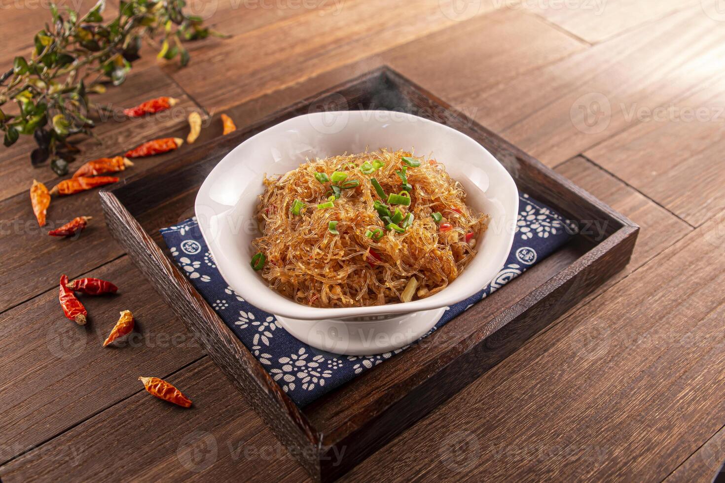 Spicy ants on the tree noodles served dish isolated on wooden table top view of Hong Kong food photo