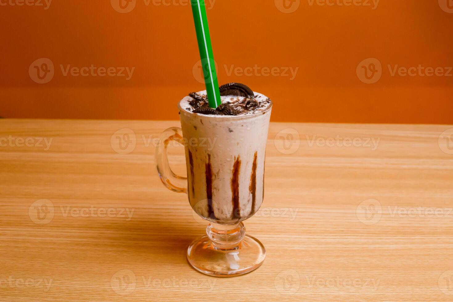 Oreo Milkshake served in glass isolated on table top view bangladeshi drink photo
