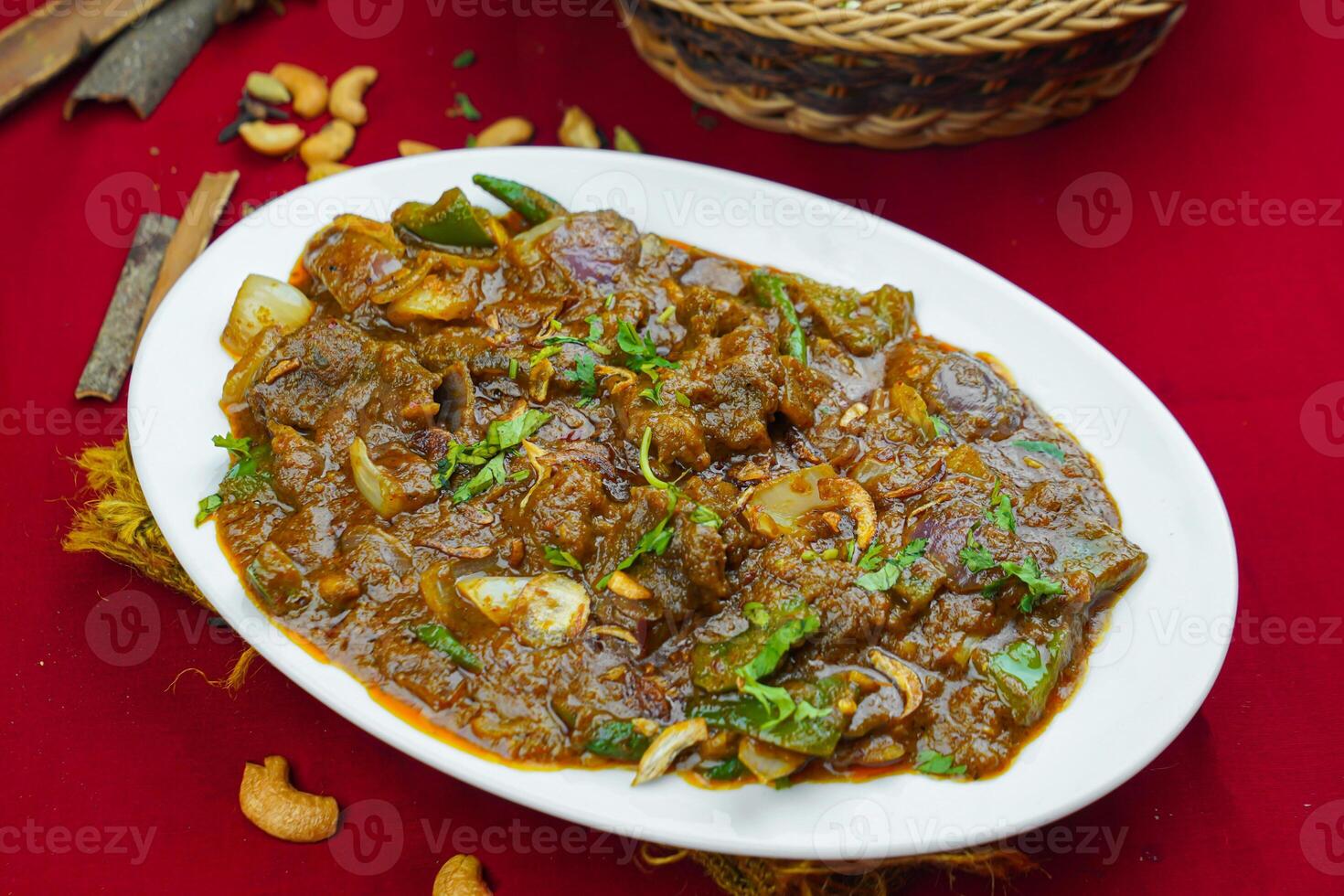 beef karahi korma rogan gosht masala with bread served in karahi isolated on table top view of indian, pakistani and punjabi spicy food photo