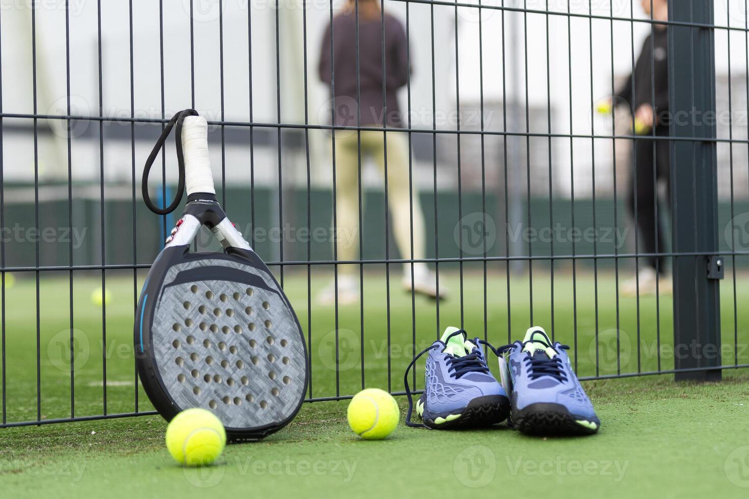 Paddle tennis objects and court. photo