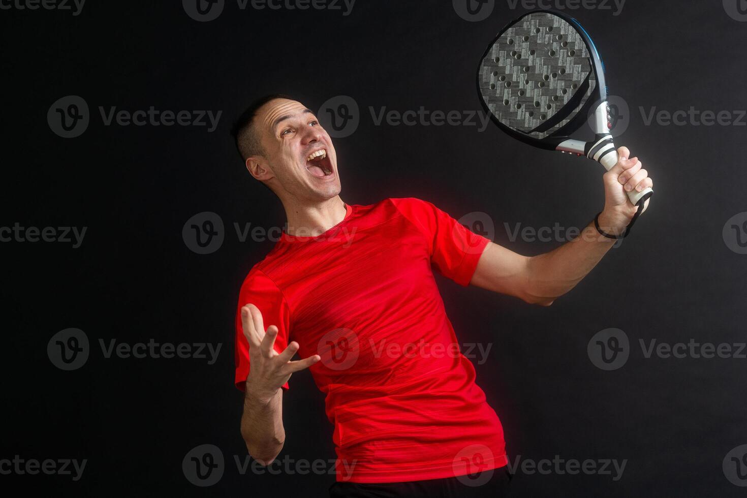 Paddle tennis. Man, Player with hand and Paddel racket and ball photo