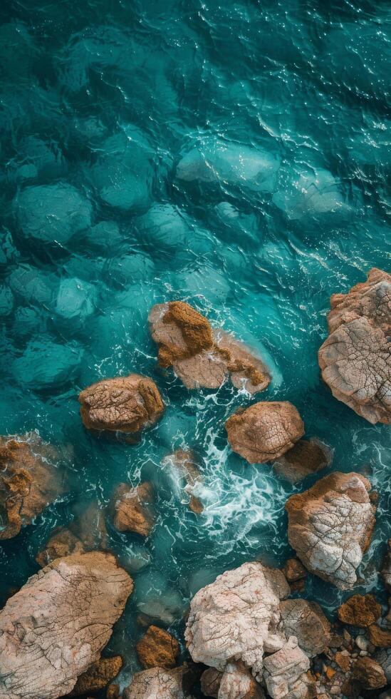 AI generated Aerial View of Ocean and Rocks photo