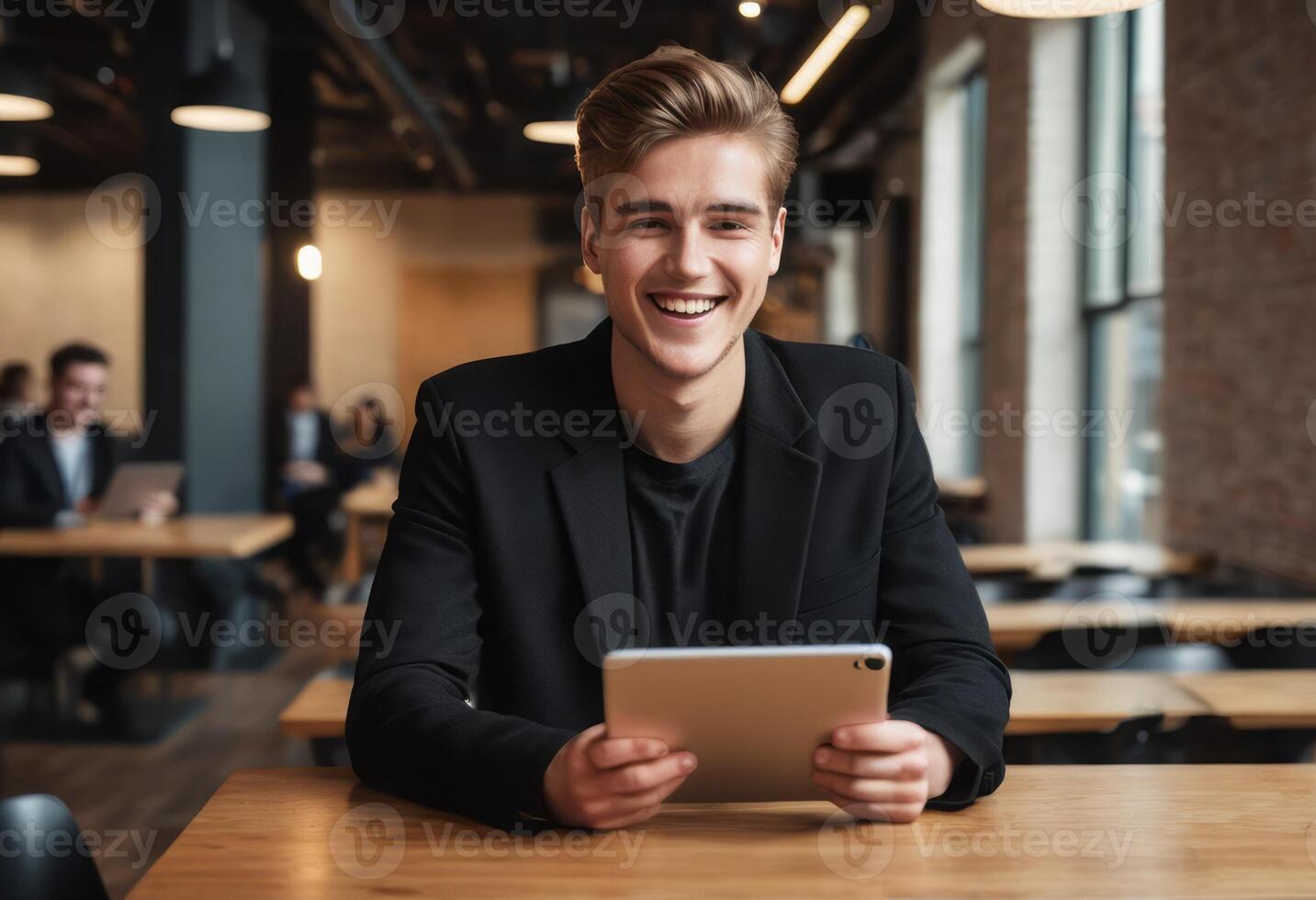 AI Generated A businessman in a stylish black jacket works with a digital tablet in a co-working space. His cheerful expression shows enjoyment in his work. photo