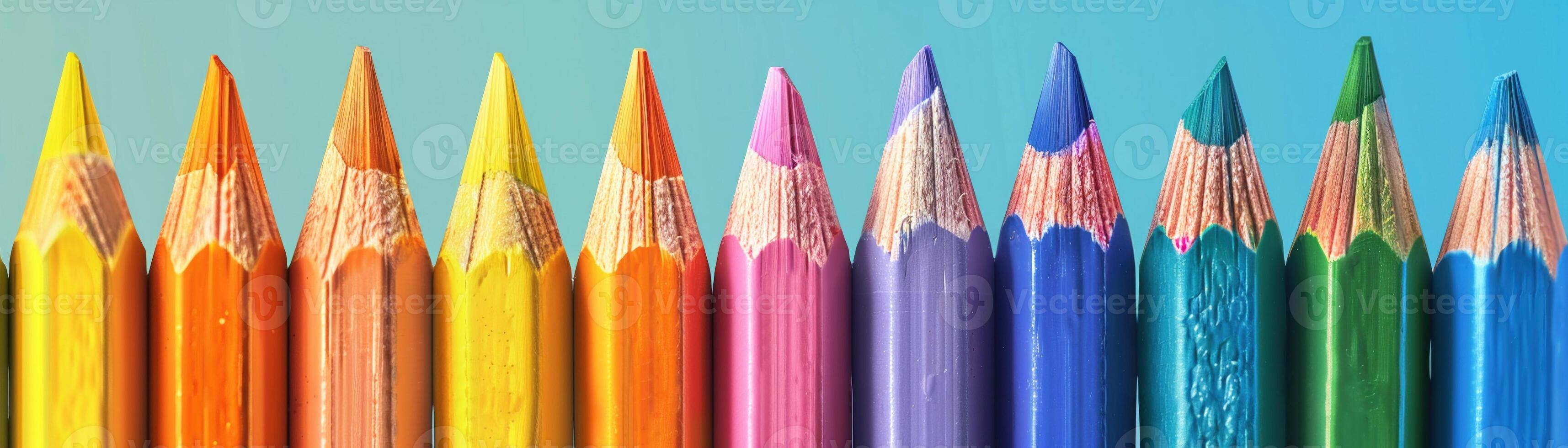 AI generated A set of sharpened colorful pencils arranged in a gradient formation photo