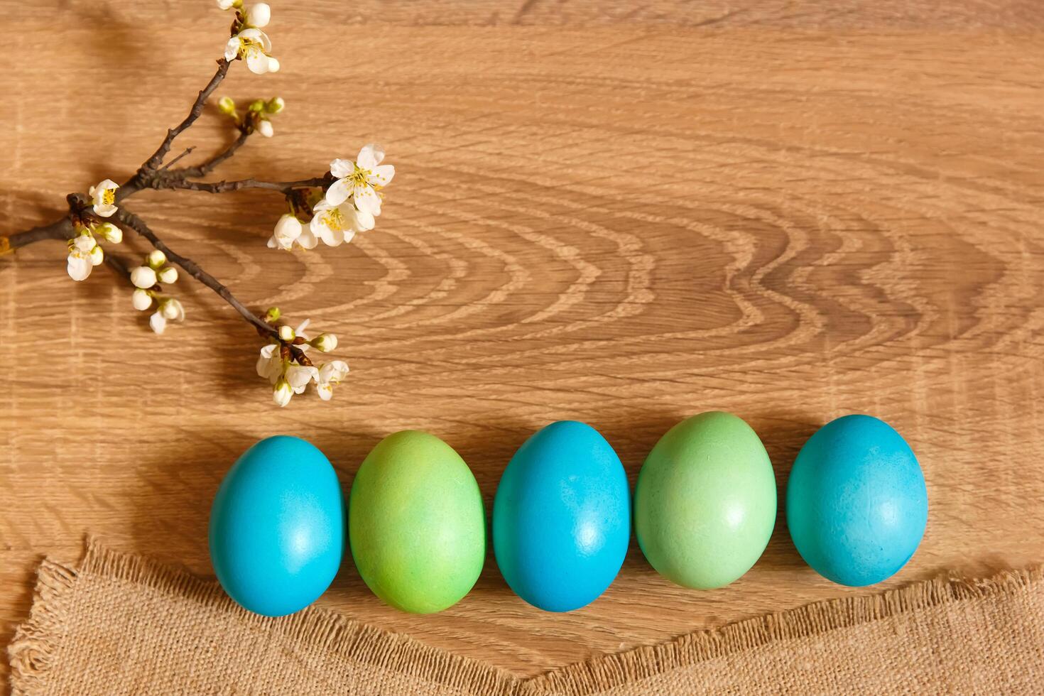 Paint eggs for Easter, bright Easter holiday, children paint eggs, colored eggs in a basket, colored eggs on a stand, Holiday background photo