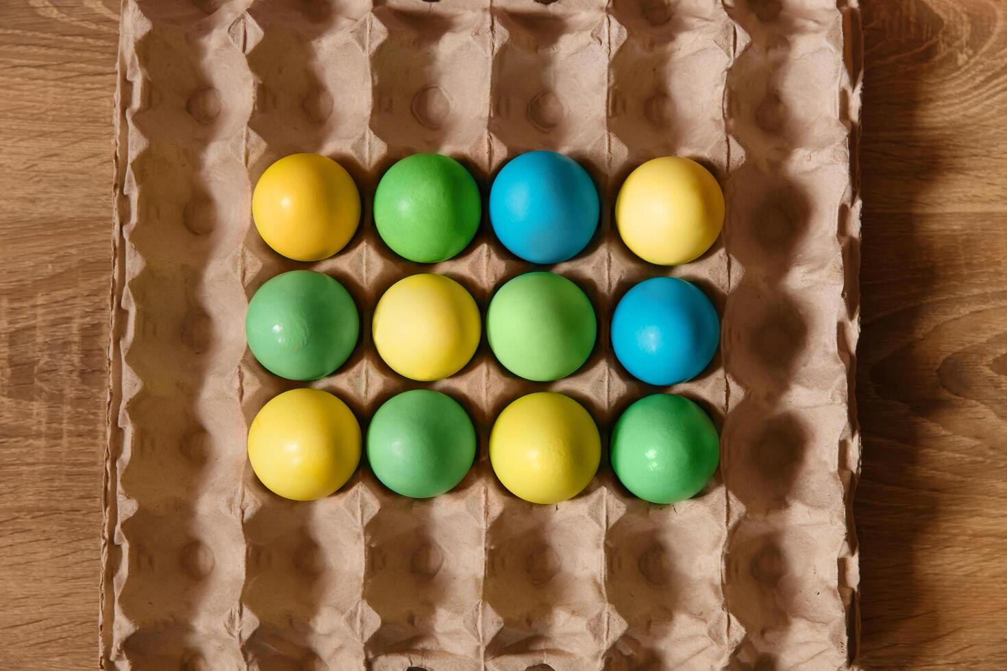 Paint eggs for Easter, bright Easter holiday, children paint eggs, colored eggs in a basket, colored eggs on a stand, Holiday background photo