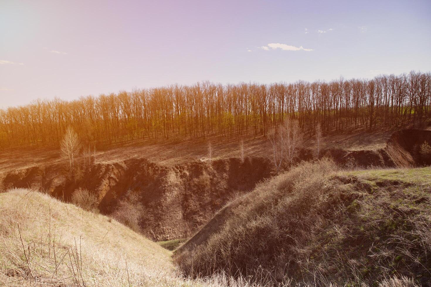 landscape with mountains, burn and sky, view of the city, mountains and trees in spring, spring photo