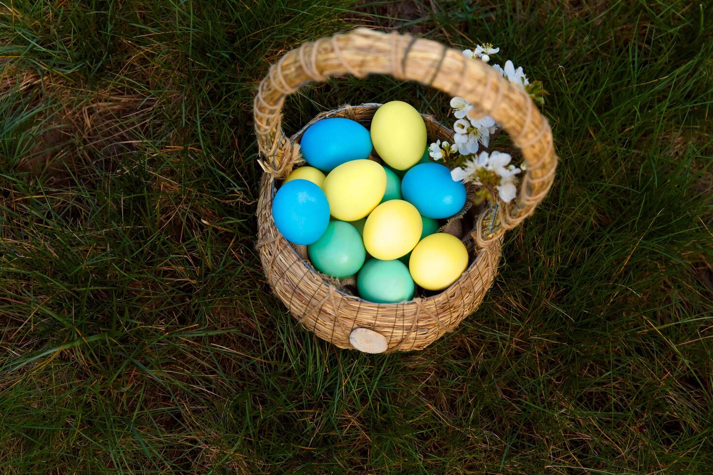 Paint eggs for Easter, bright Easter holiday, children paint eggs, colored eggs in a basket, colored eggs on a stand, Holiday background photo