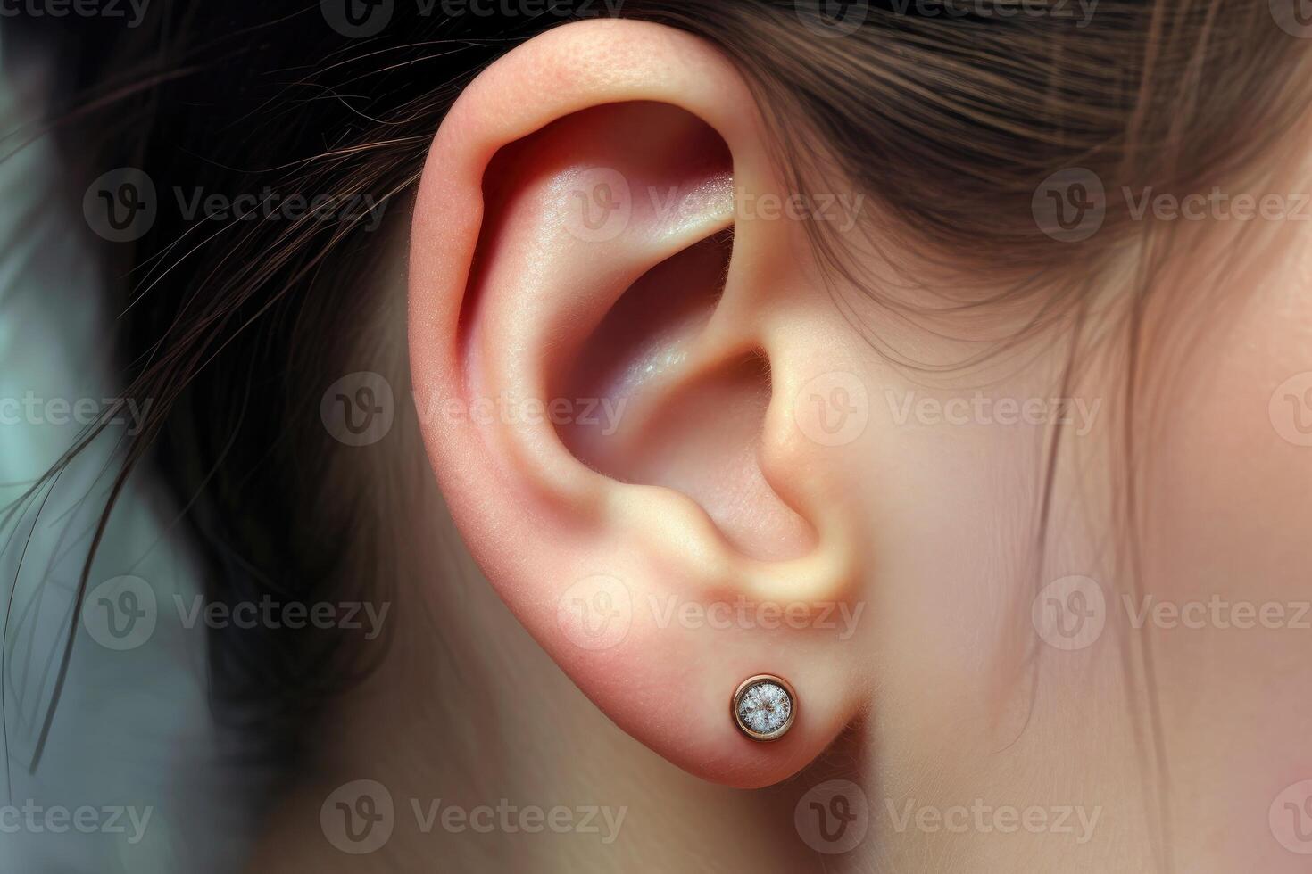 AI generated Close up of a woman's ear with a small diamond earring photo