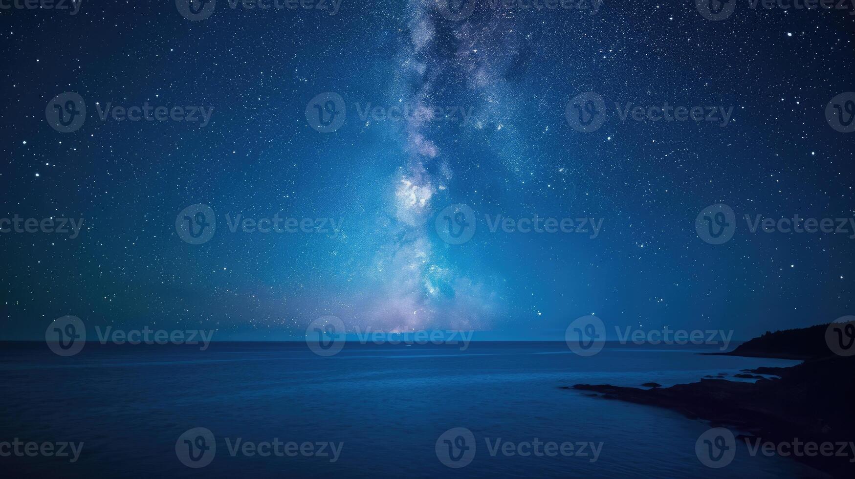 AI generated Milky Way galaxy over the ocean with rocky coastline in the foreground photo