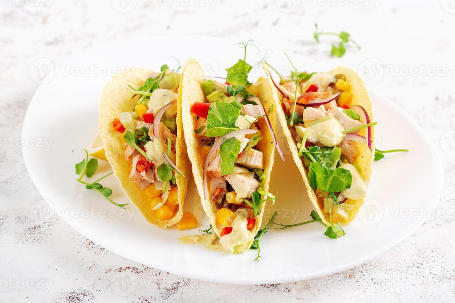 Mexican tacos with chicken meat, corn and salsa. Healthy tacos. Diet menu. Mexican taco. photo