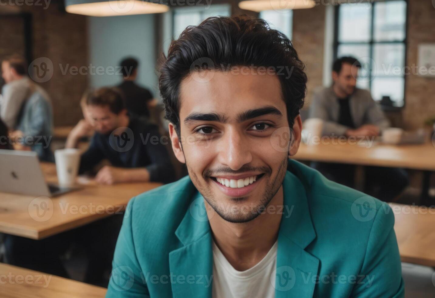 AI Generated A professional young man smiles confidently in an office space. His bright teal blazer suggests a creative flair in his work. photo