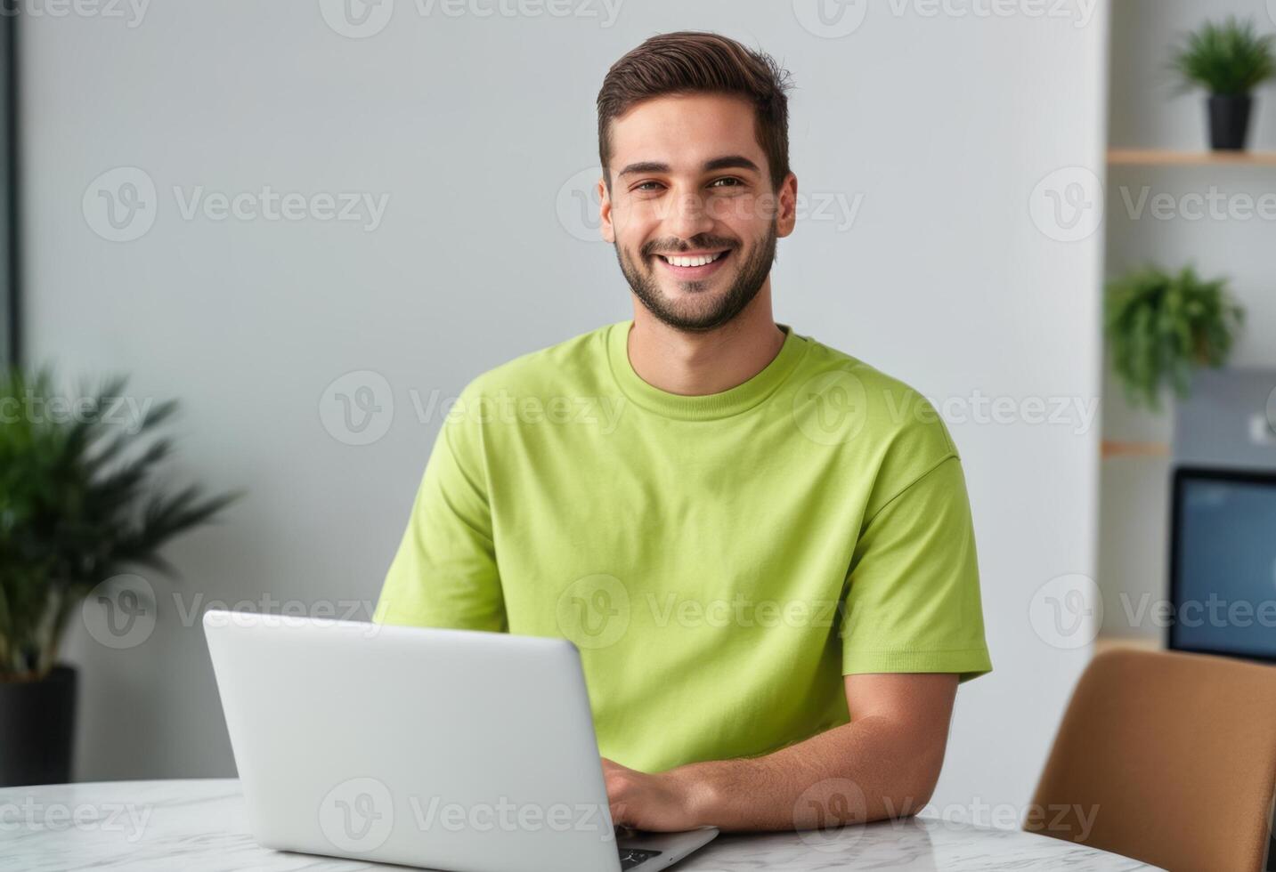 AI Generated Young man in green t-shirt working on his laptop. Casual and focused work environment. photo