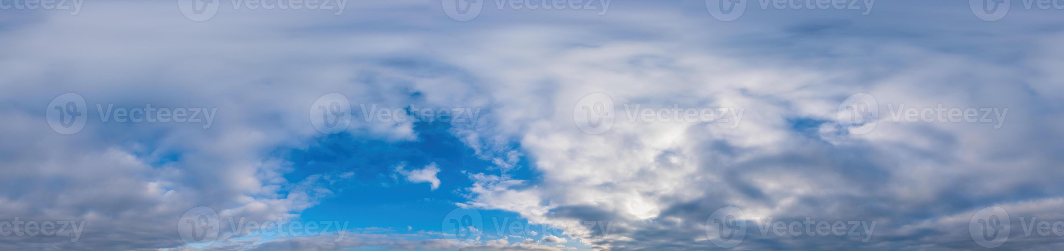 Winter sky panorama with Cumulonimbus clouds in Seamless spherical equirectangular format. Full zenith for use in 3D graphics, game and composites for aerial drone 360 degree panoramas as sky dome. photo