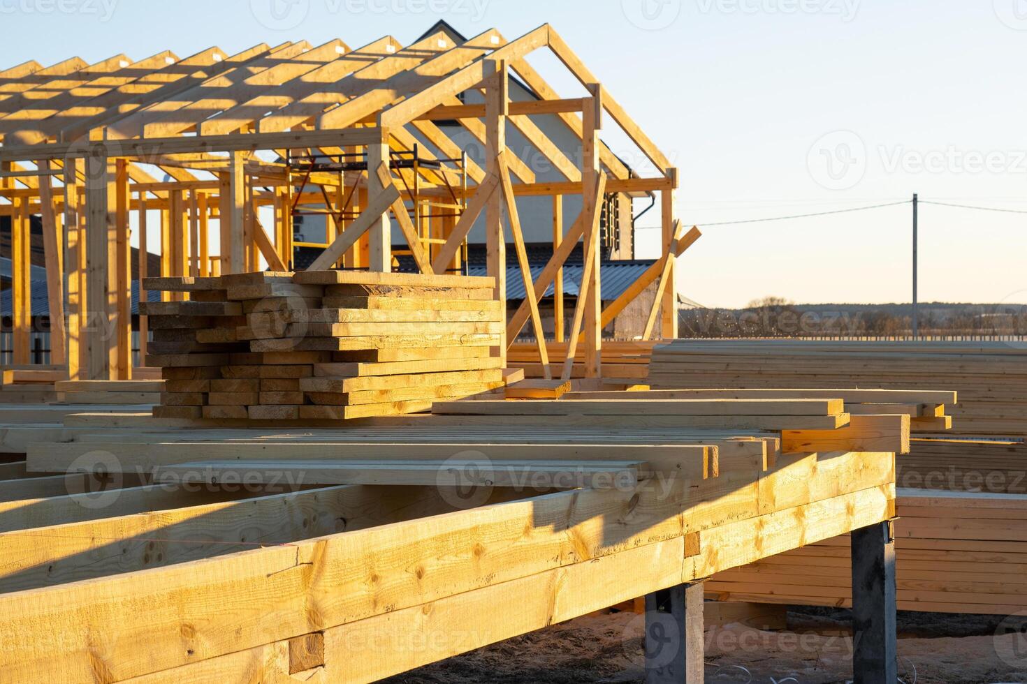 Construction of a wooden frame house - frame from the foundation, walls, roof on stilts is a construction site, the process of building a frame photo