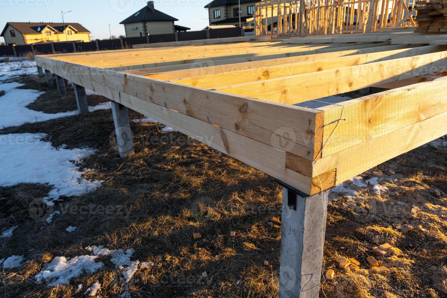 The foundation of a wooden frame house on stilts is a construction site, the process of building a frame photo