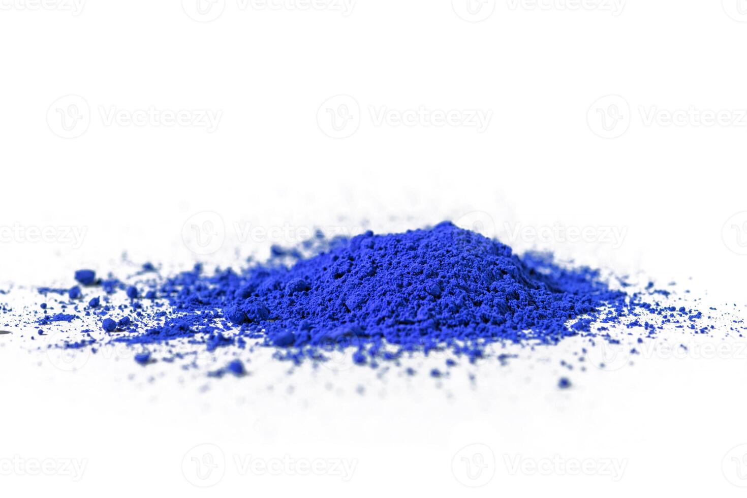 ultramarine pigment, dry paint on a white background, macro photo