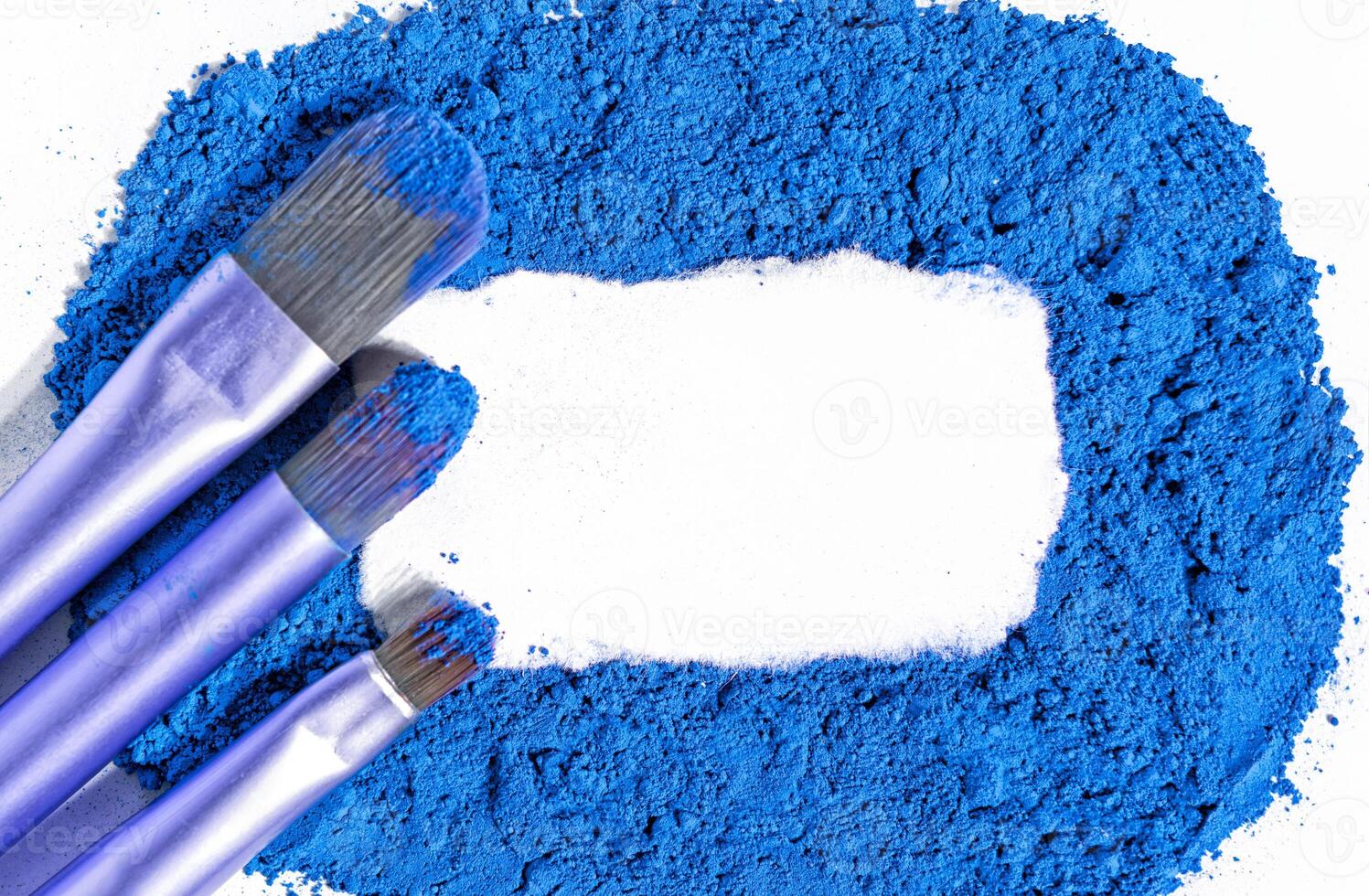 dry natural blue paint with white space for text. macro photo