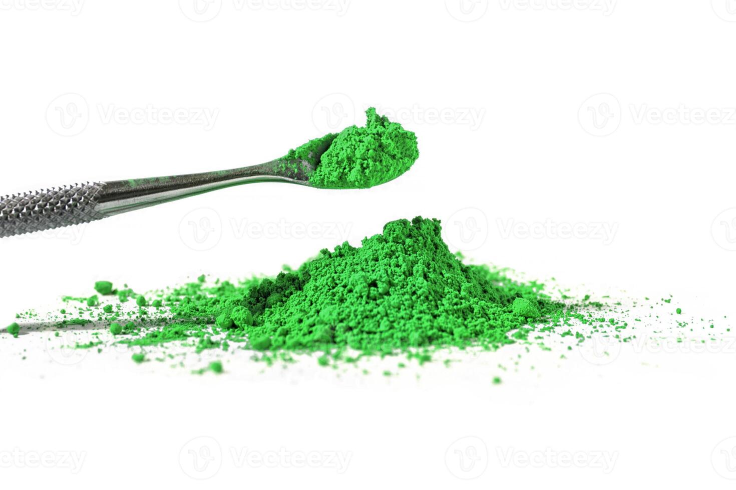 cobalt green, dry paint on a white background, macro photo