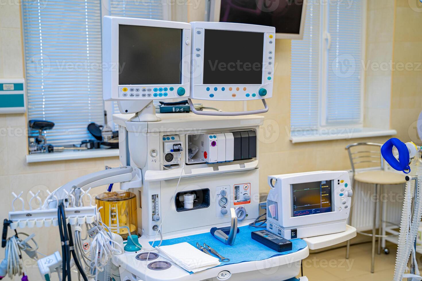 Artificial lung ventilation monitor in the intensive care unit. Nurse with medical equipment. Ventilation of the lungs with oxygen. COVID-19 and coronavirus identification. Pandemic. photo