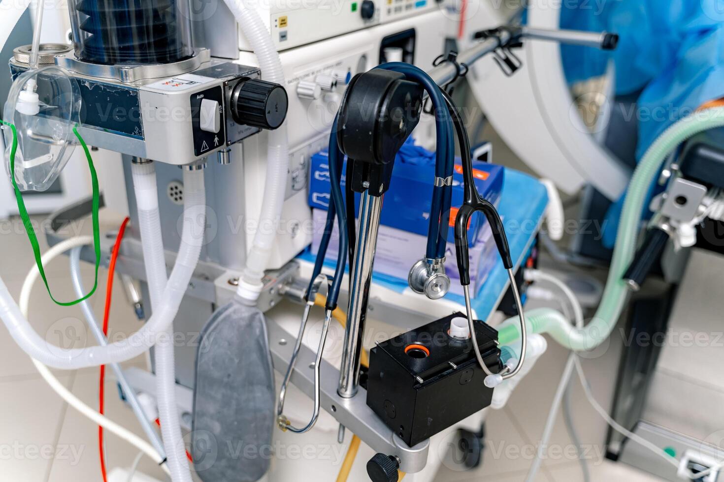 Mechanical ventilation equipment. Ventilation of the lungs with oxygen. Equipment for operation. Stethoscope hanging on lungs ventillation machine. Selective focus. photo