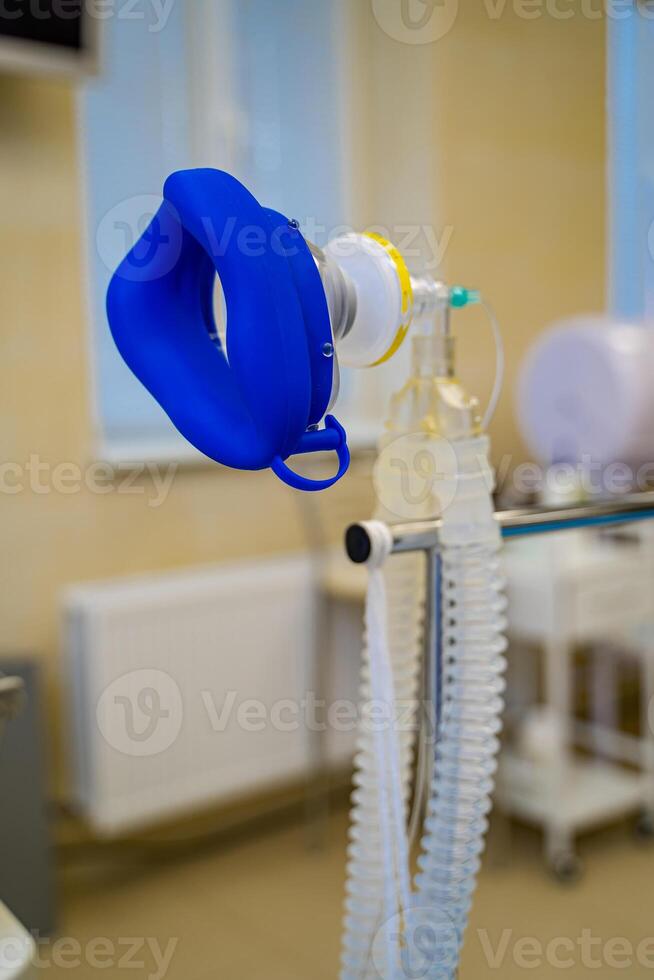 Artificial lung ventilation mask in the intensive care unit. Medical equipment. Ventilation of the lungs with oxygen. photo