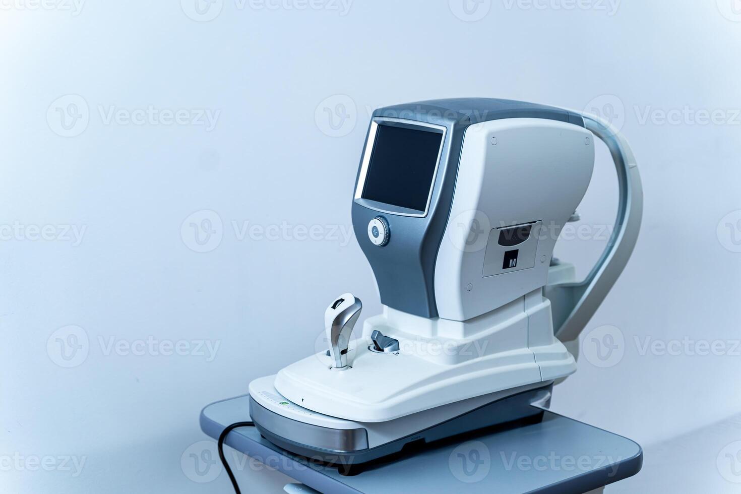 Microscopic apparatus for checking eyesight close-up. Ophthalmology and treatment of eye diseases. Eye clinic, Optometrist. Eye sight device. photo