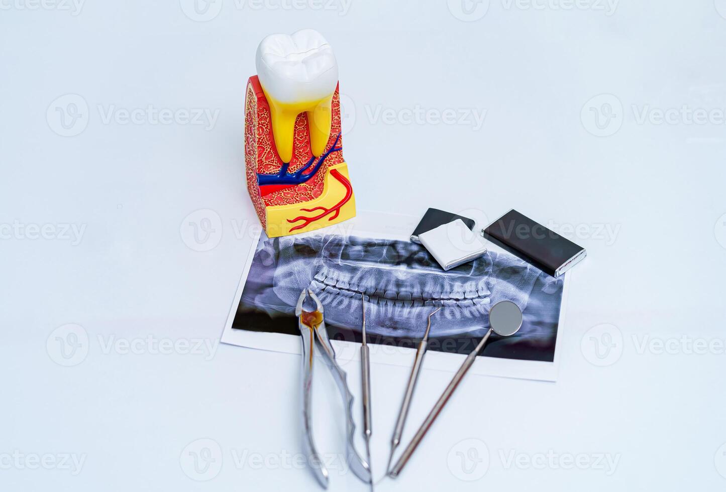 Set of dentist tools on white background photo