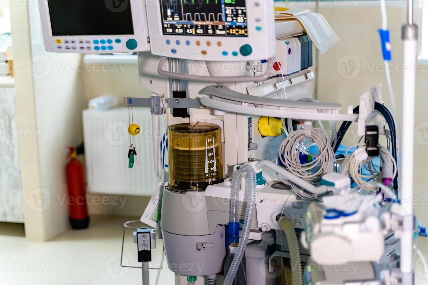 Artificial lung ventilation monitor in the intensive care unit. Nurse with medical equipment. Ventilation of the lungs with oxygen. photo