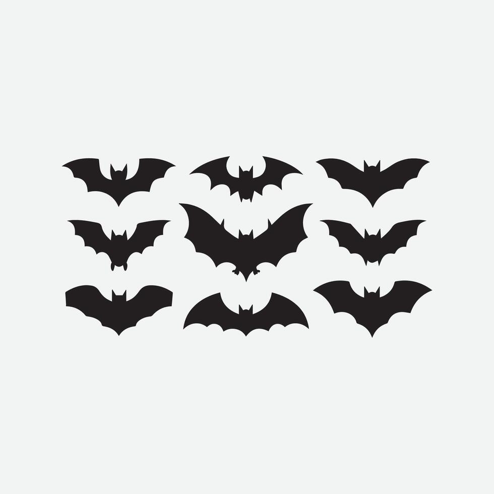 Black silhouettes of bats set on white background vector art illustration