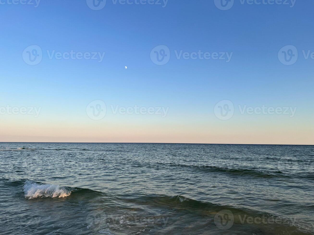 Ocean Waves at Sunset photo