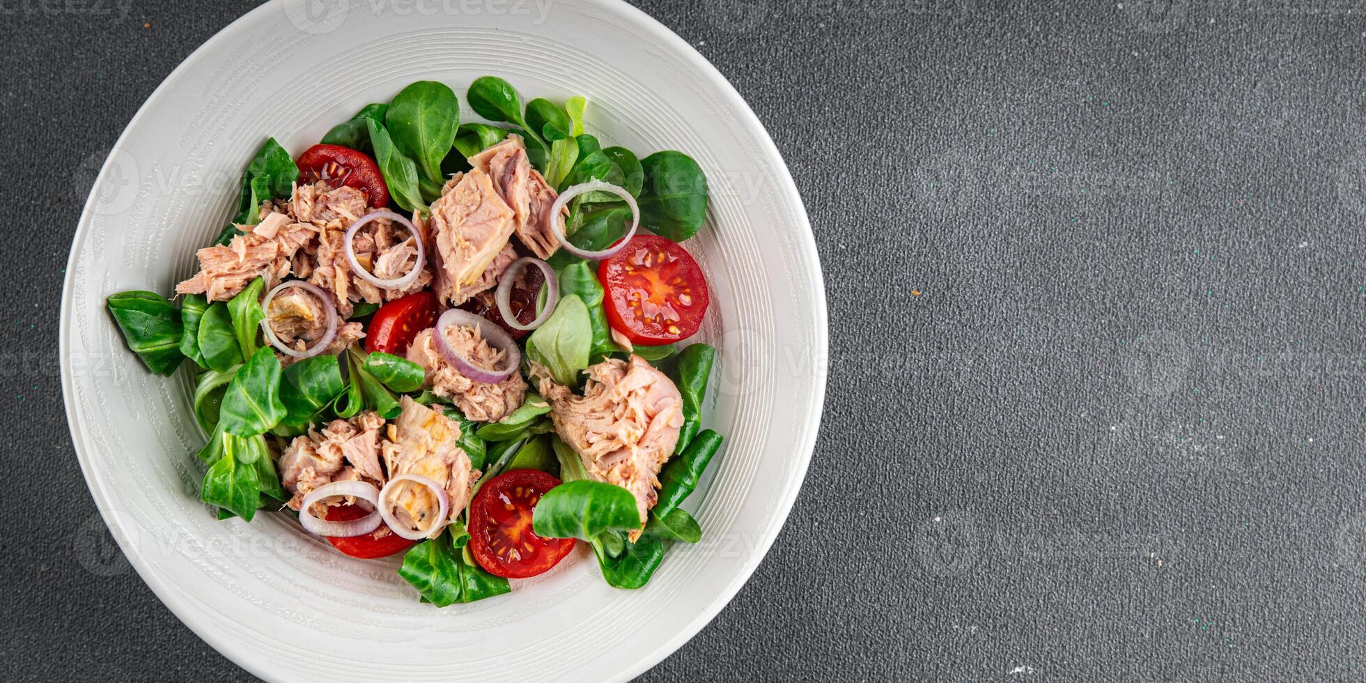 tuna salad, tomato, green leaf lettuce, onion healthy eating cooking appetizer meal food snack on the table copy space food background rustic top view photo