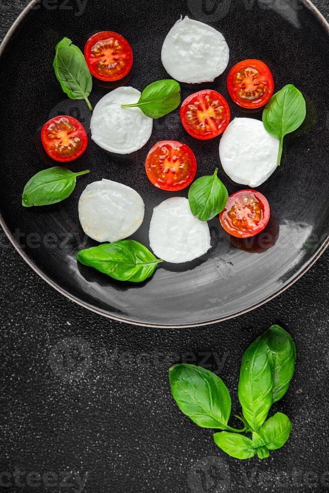 mozzarella salad caprese tomato, basil fresh food tasty eating appetizer meal food snack photo