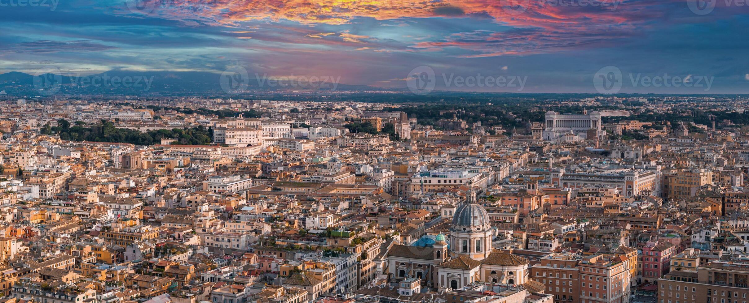 Aerial View of Rome at Dusk  Historic Architecture and Sunset Sky photo