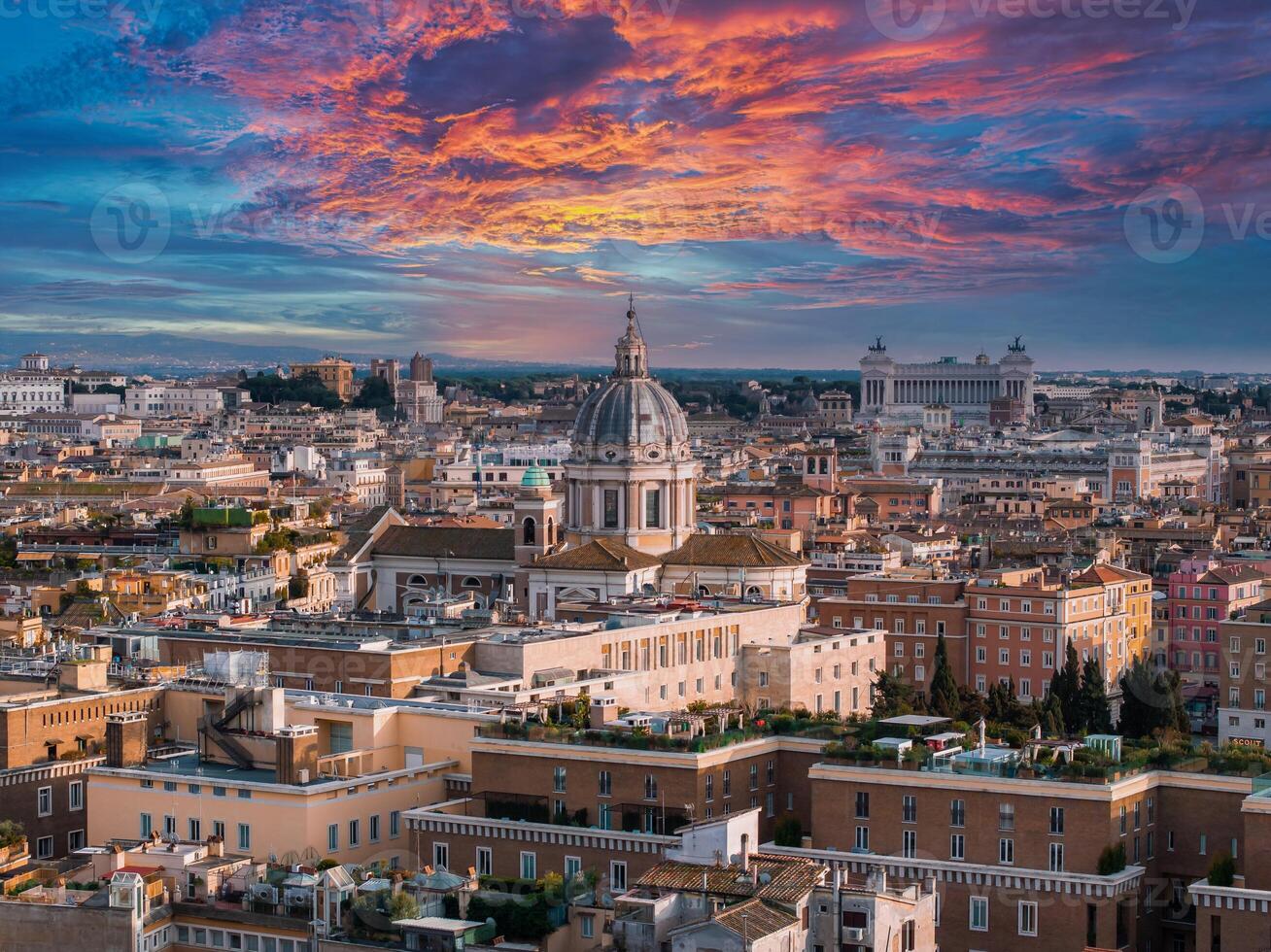 Aerial Sunset View of Rome with Historic Architecture and Vibrant Sky photo