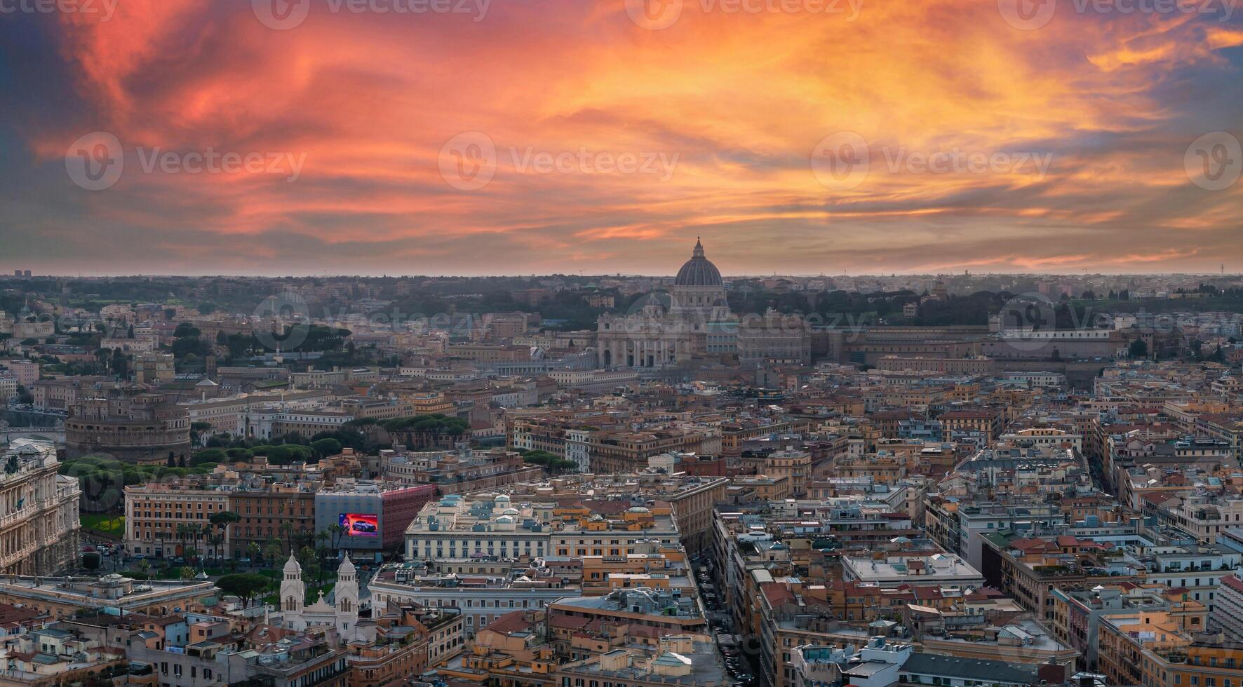 Golden Hour Aerial View of Rome with St. Peter's Basilica in the Background photo