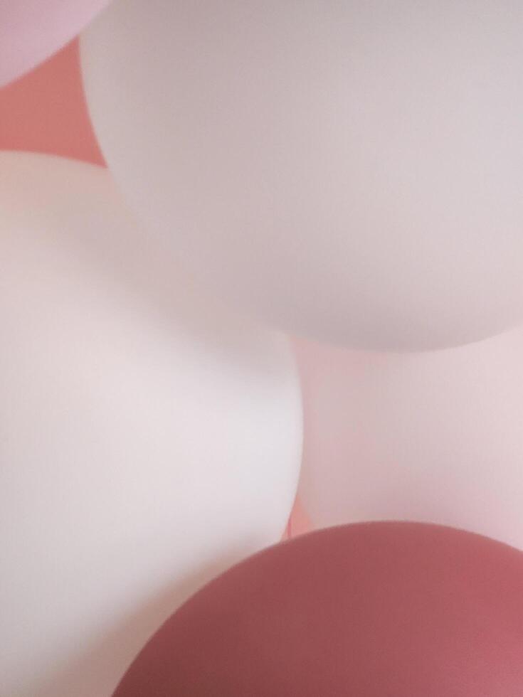 Pink and white balloons. Background with balloons photo