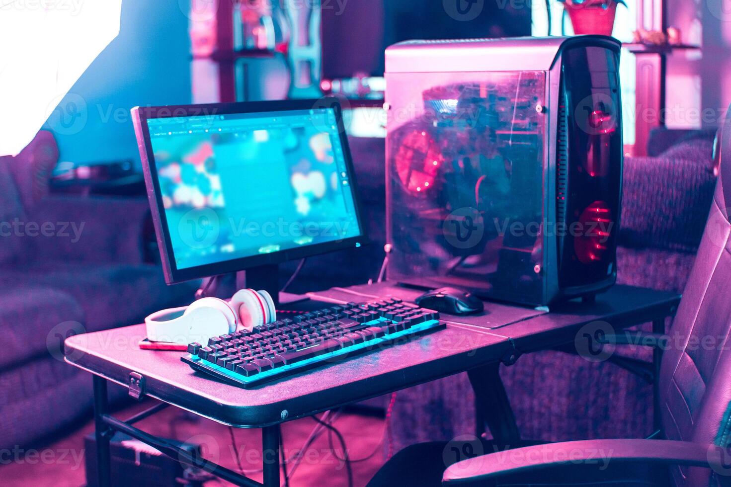 Personal computer with cpu and monitor for professional gamer gamer with keyboards and mouse with neon light. photo