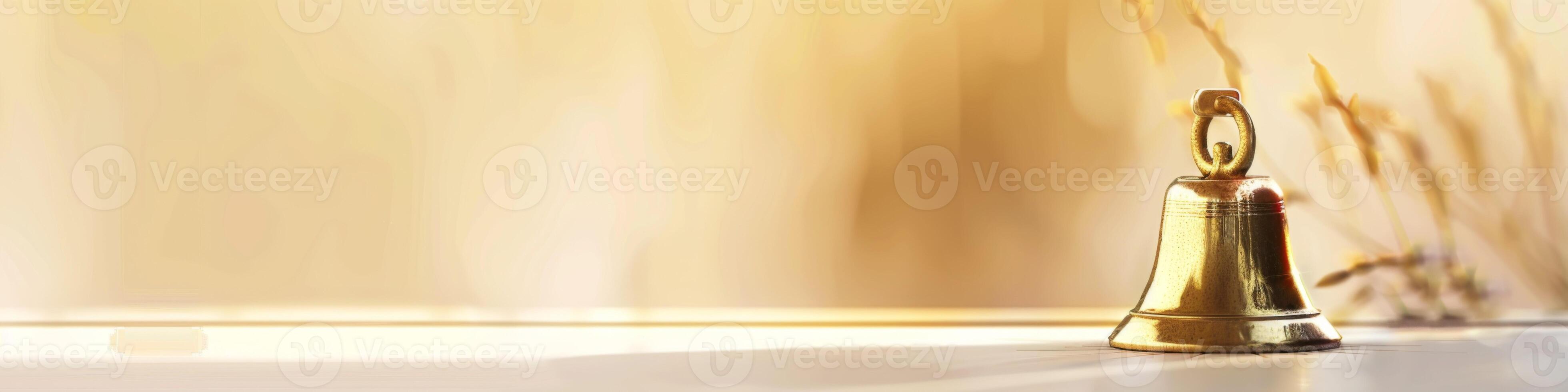 AI generated Shining brass bell on tabletop with elegant golden bokeh background photo