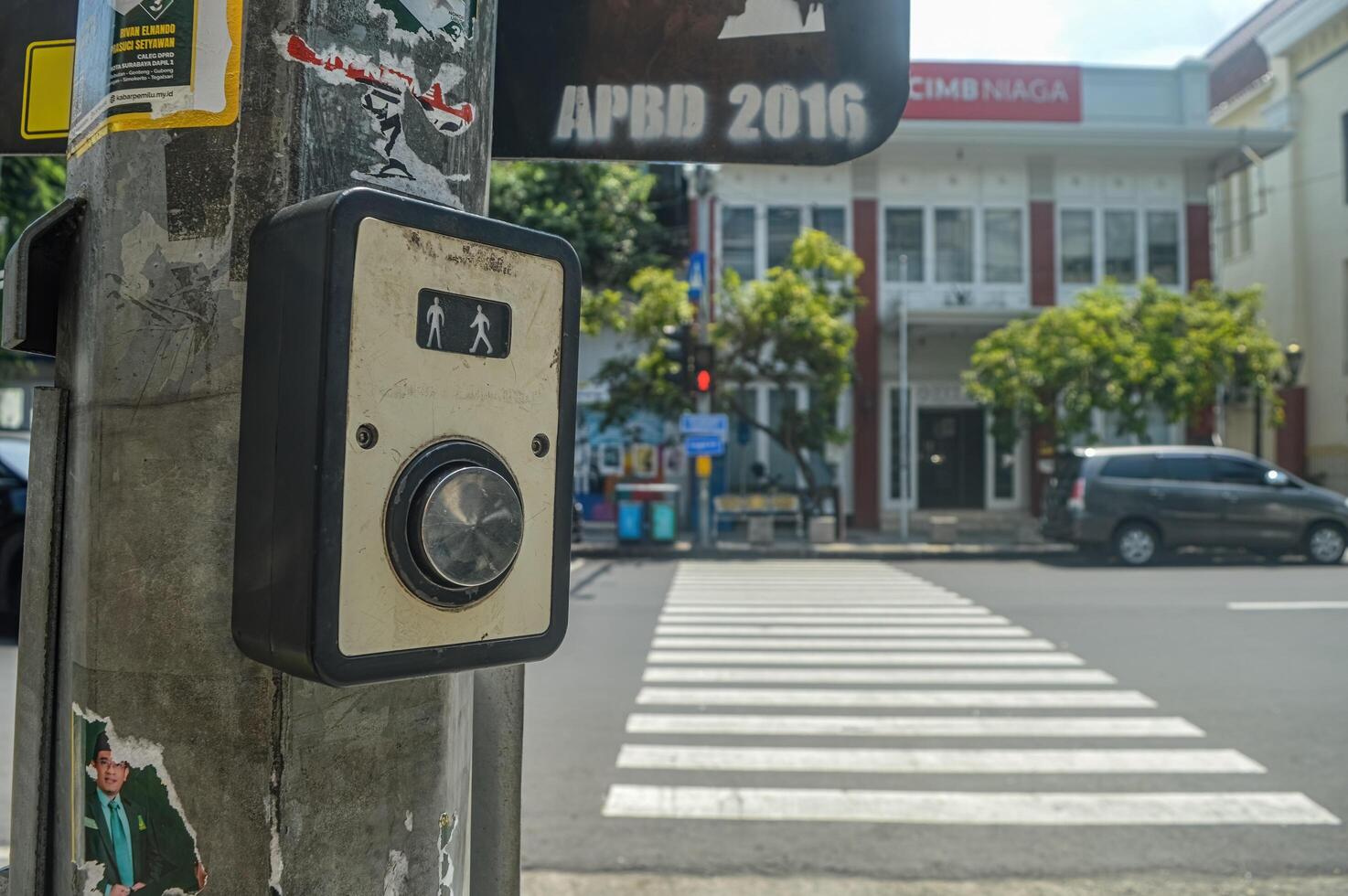 a zebra crossing equipped with traffic lights without people, Indonesia, 2 March 2024. photo