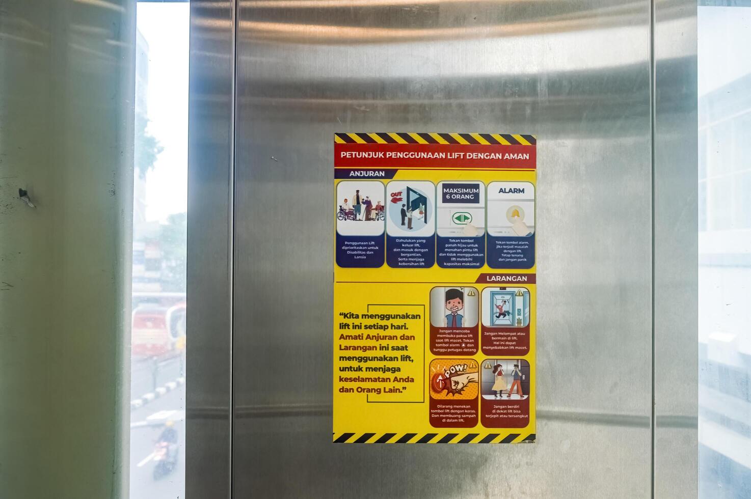 poster instructions for using the lift or elevator, Indonesia, 2 March 2024. photo