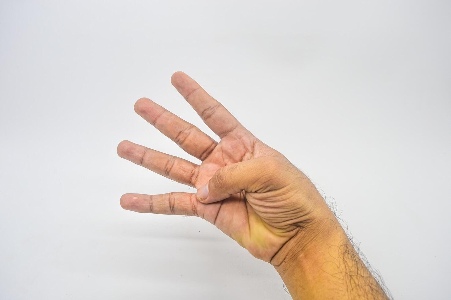 hand gesture that counts the number four photo