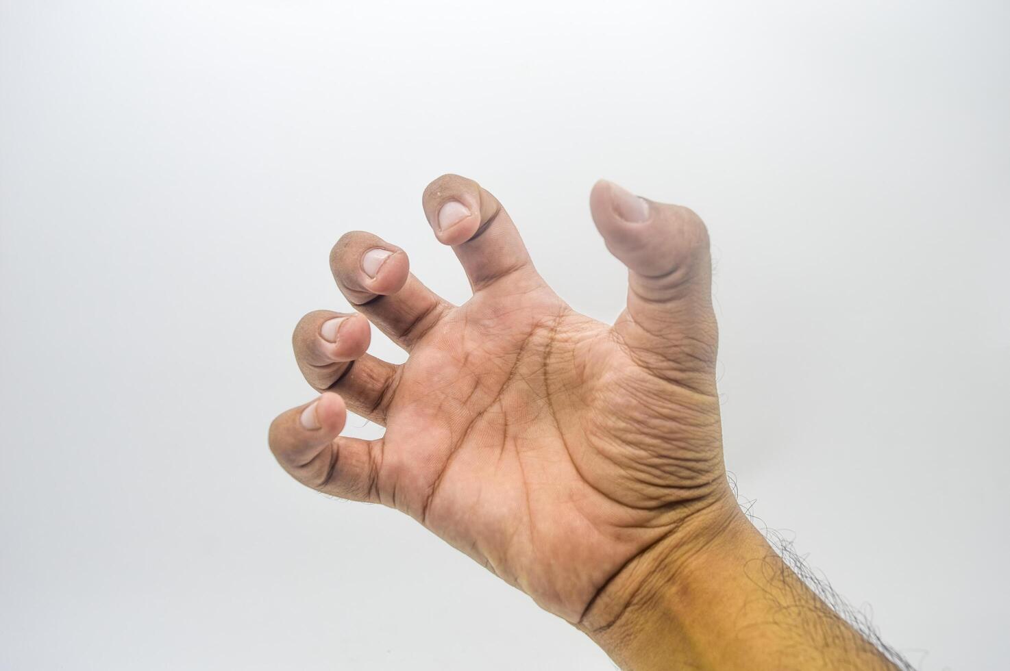 gripping hand gesture isolated on white background photo