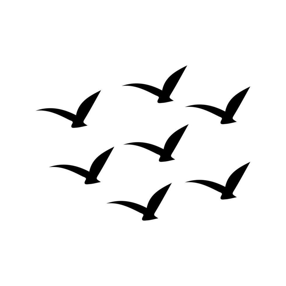 un grupo de aves volador silueta vector