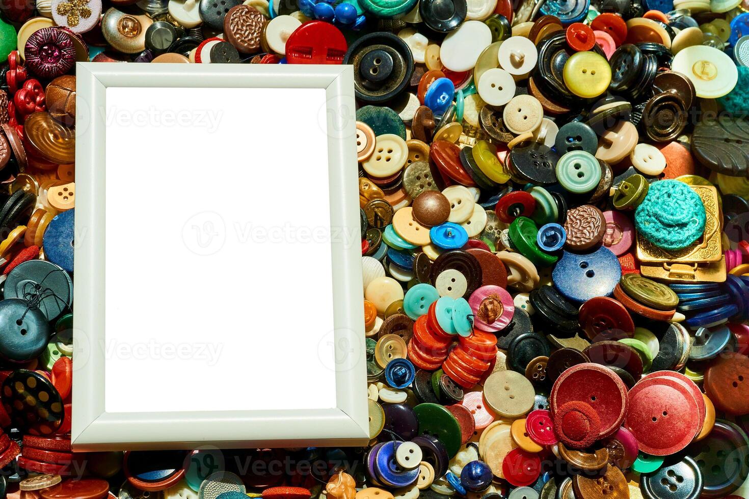 Blank matte frame and place for text on tailor buttons background photo