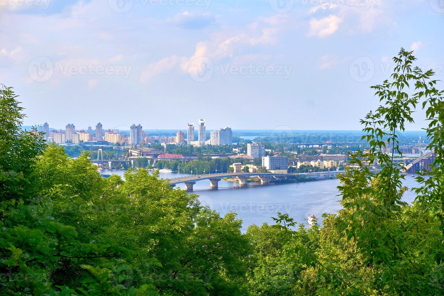 Residential area of the city with a river and bridges. Kyiv, Dnieper River photo