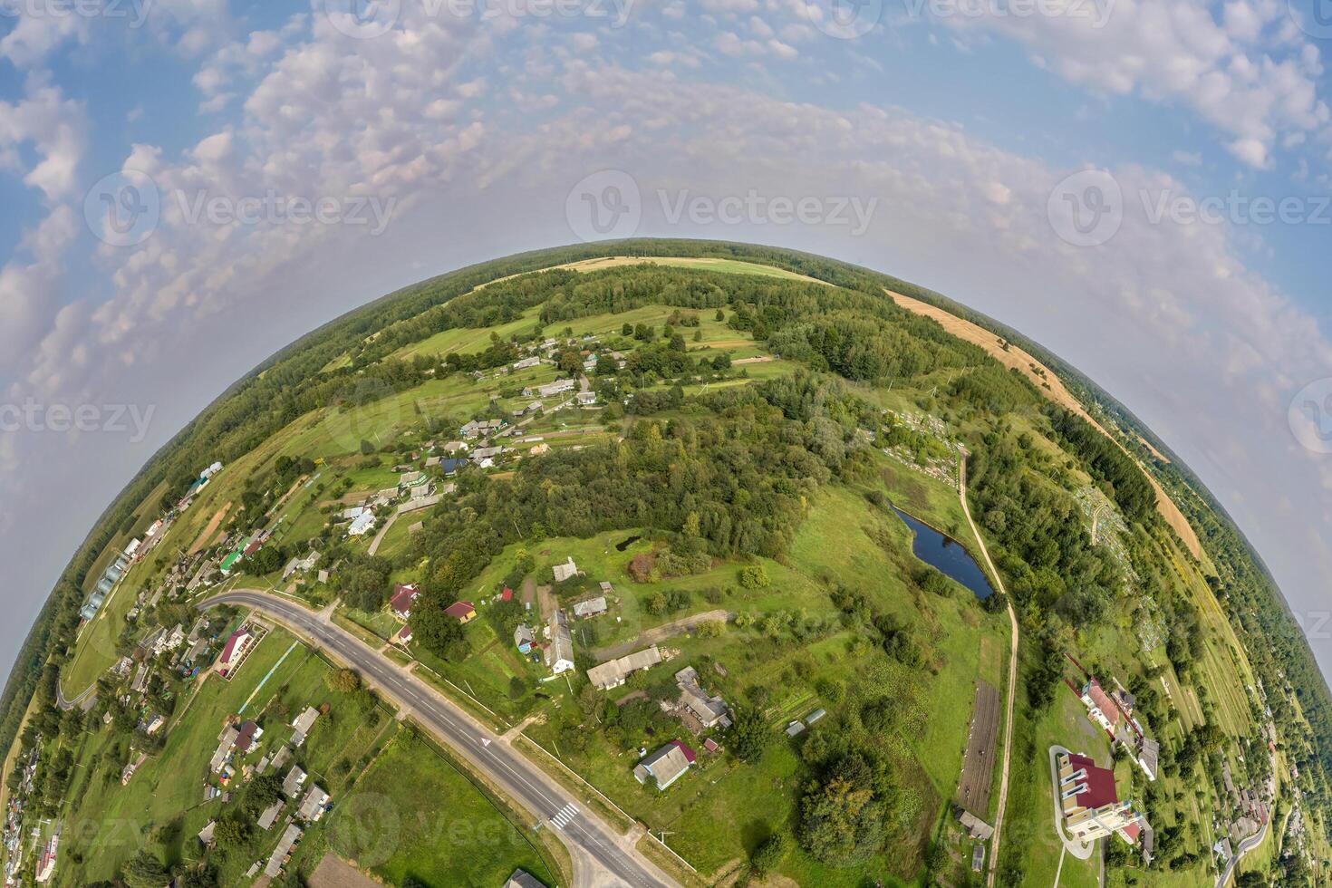 aéreo ver desde alto altitud minúsculo planeta en cielo con nubes con vista a antiguo ciudad, urbano desarrollo, edificios y cruce. transformación de esférico 360 panorama en resumen aéreo vista. foto