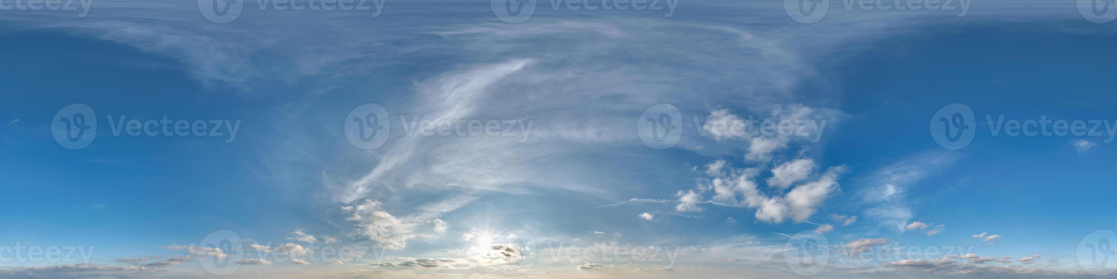 blue skydome 360 hdri panorama with twilight clouds before sunset in equirectangular format with zenith for use in 3d graphics as sky replacement or edit drone shot photo